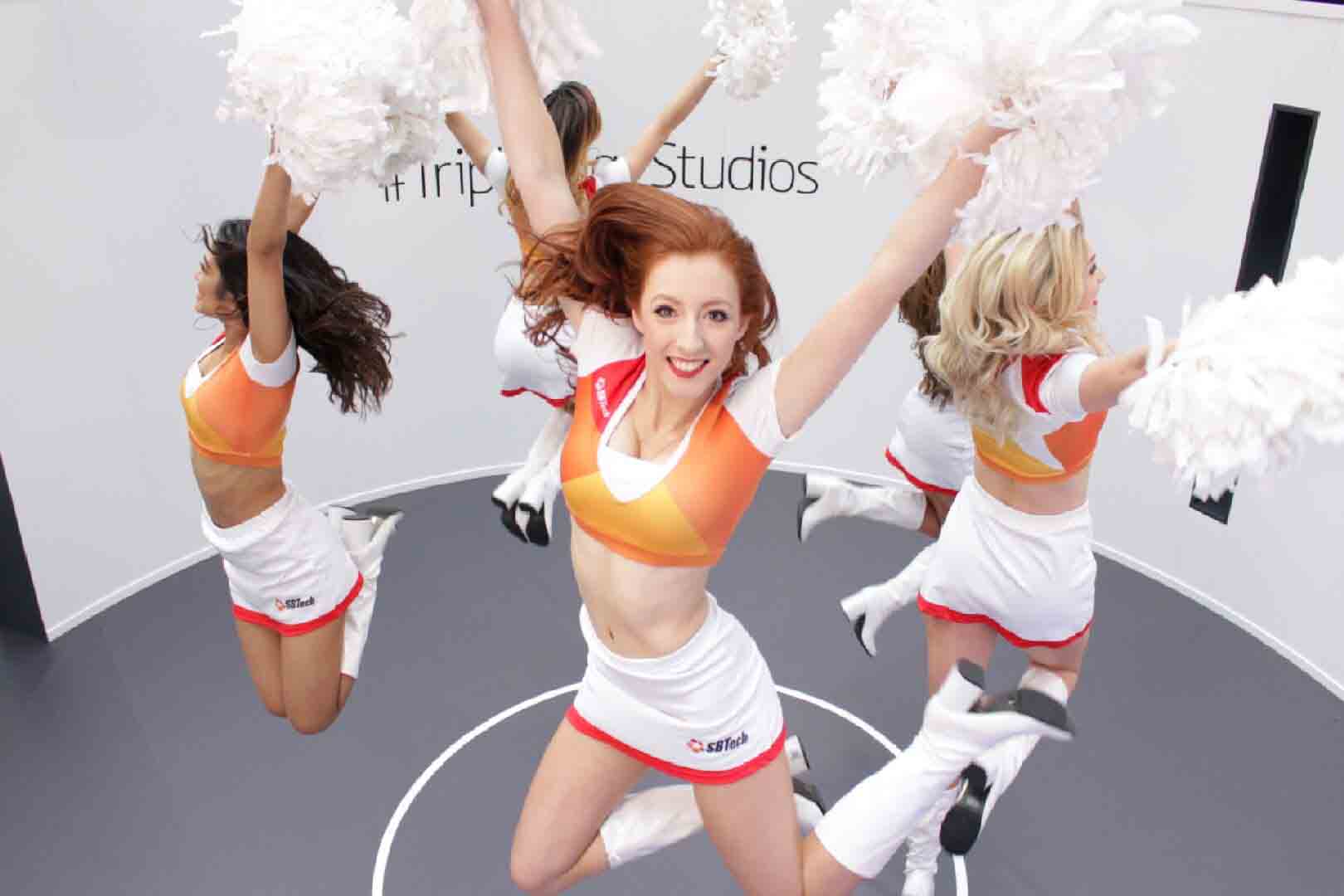 Cheerleaders inside a GIF booth